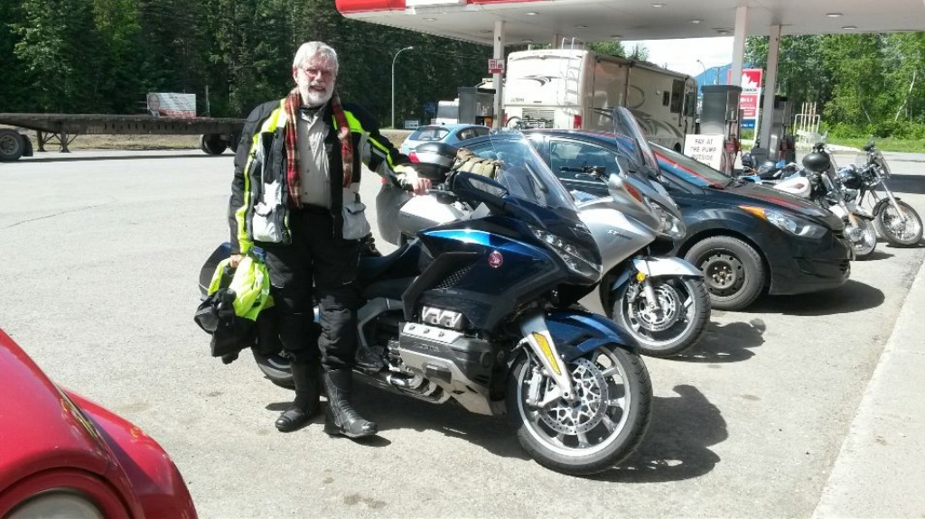 On Day 13 I enjoyed brunch at the southern end of the Cassiar, ready to start north. My young Japanese photographer, whose silver Honda is next to mine, liked the Wing so much that he wanted it in my photo of him! Last year, heading south, I arrived here in the rain.