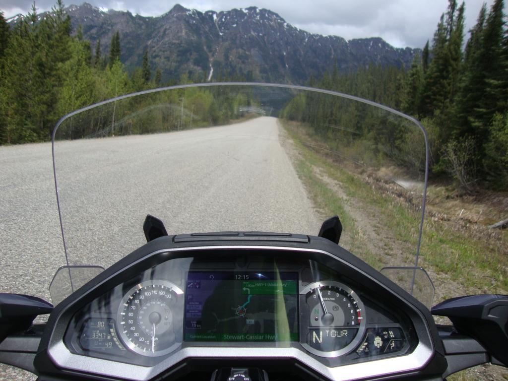 In early afternoon of Day 14 we're nearing the northern end of the Cassiar, where it meets the Alaska Highway. There was some tough construction, a steep gravel hairpin at a bridge construction site.