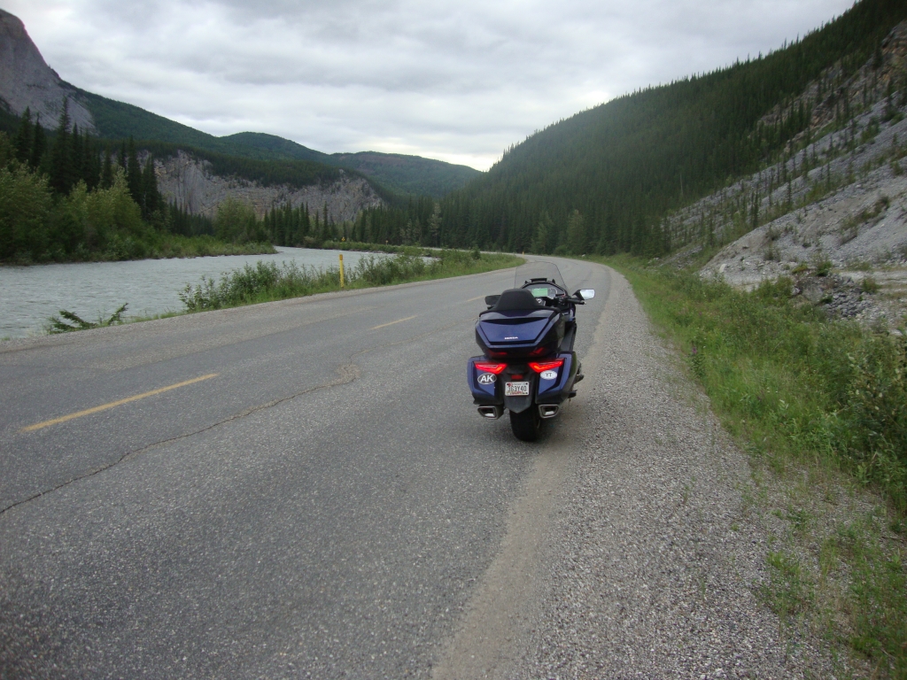 On Day 5 (July 1), I'd left Strawberry Flats early (6:05 AM), eager to use rain-free weather. This photo, about 6:40 AM, is on a pleasant stretch along the Toad River before we reached the town. The rain began just after our fuel stop there.