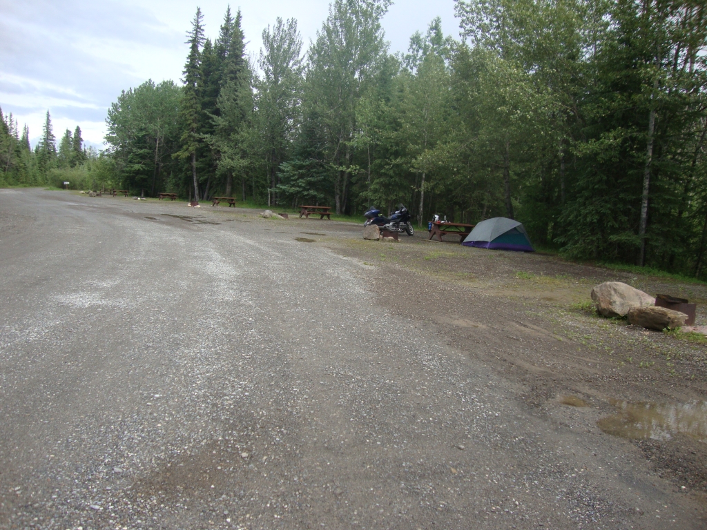 Night 5: With rain virtually constant from Toad River to Fort Nelson, including the gorgeous Stone Mountain traverse, I was delighted to find the sky clearing at my Fort Nelson lunch stop. With the tire appointment giving me plenty of time, I pulled up around 2:30 PM at Buckinghorse River Campground, about 30 miles north of Pink Mountain.