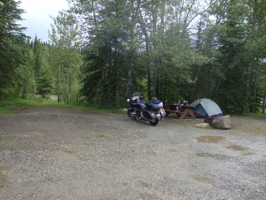 Arriving so early, I had the place to myself so I did not realize that open area was not a path to the river but parking for trailers! I apologized to an Ontario man named Dennis, who backed in carefully and invited me to have a beer and rest in his trailer while he and his wife were at dinner with another couple parked nearby.