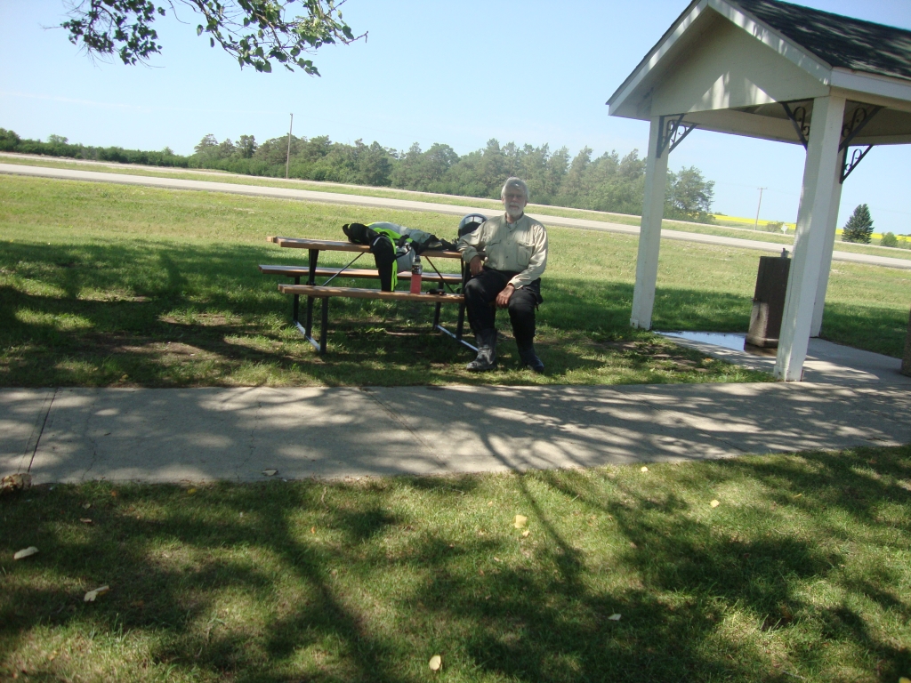 On Day 10 (July 6), about 11:30 CDT I enjoyed a pause at another pleasant community rest area, perhaps at Whitewood SK, as we approach the Manitoba border on Canada 1. Night 10 was at a less-than-ideal Days Inn in Portage la Prairie MB.