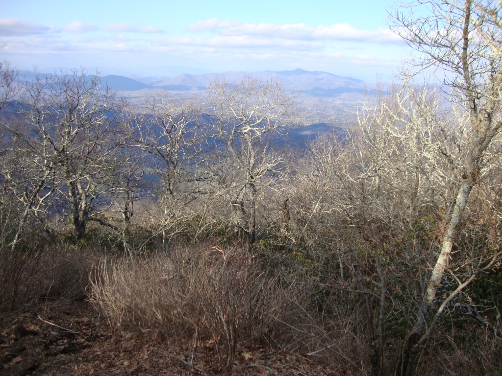 At 6:00 PM I reached this summit of Blood Mountain. An hour earlier I'd sidetracked to Woods Hole Shelter, where several of us were planning to stay that night, and found only a small-print yellow-highlighted notice of the bear-canister requirement. With no posting at Jarrard Gap, the region's southern boundary, I pity anyone who hadn't heard about it beforehand!