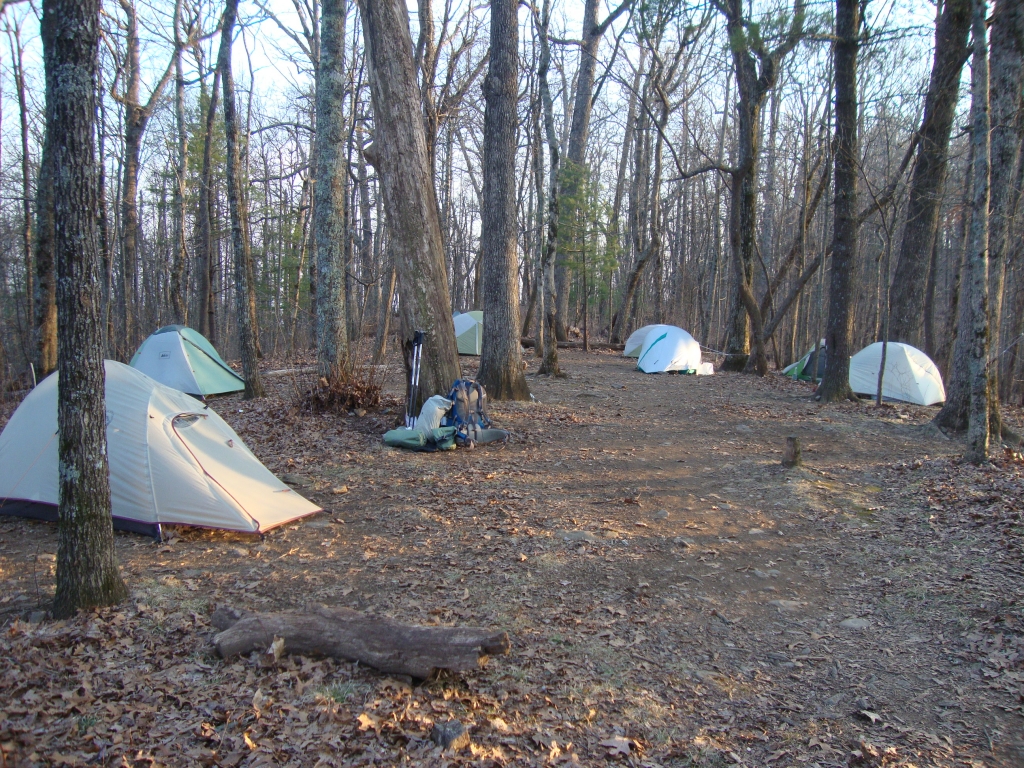At 5:00 PM I rolled into the Blue Mountain Shelter; I'd crossed Chatahoochie Gap nearly two hours earlier. This 7 PM shot shows most of the tents erected in the vicinity of the shelter. Behind the shelter, some used hammocks.