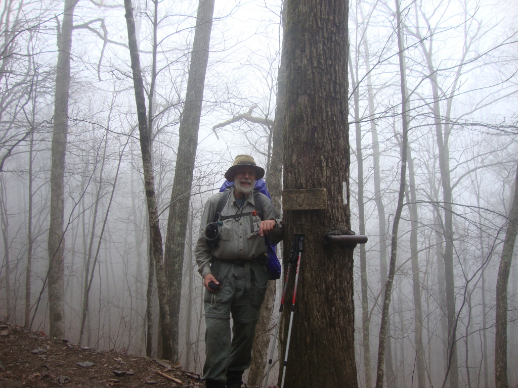 An insurance shot of the state line! The subsequent climb over Courthouse Knob was tough --- quite an introduction to North Carolina walking --- in sleet and a cold, blustery wind. I was glad to arrive at Muskrat Creek Shelter shortly before 3:00 PM.