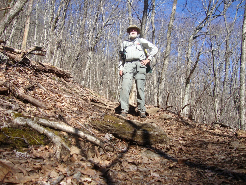 At 10:45 AM on Tuesday, March 19, I'm descending to Deep Gap. I'd left Muskrat Creek about 9:00 AM after a cold, rainy night; the shelter was full, with a couple of fellows sleeping on the ground between the platform and the picnic table. I met Mozyin, a retired corporate lawyer, here.