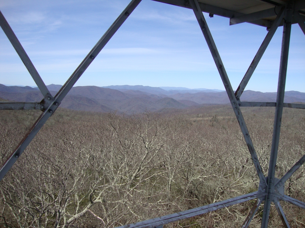 I think this one looks west. I sent a SPOT message, and my daughter identified the location as the summit of Albert Mountain!