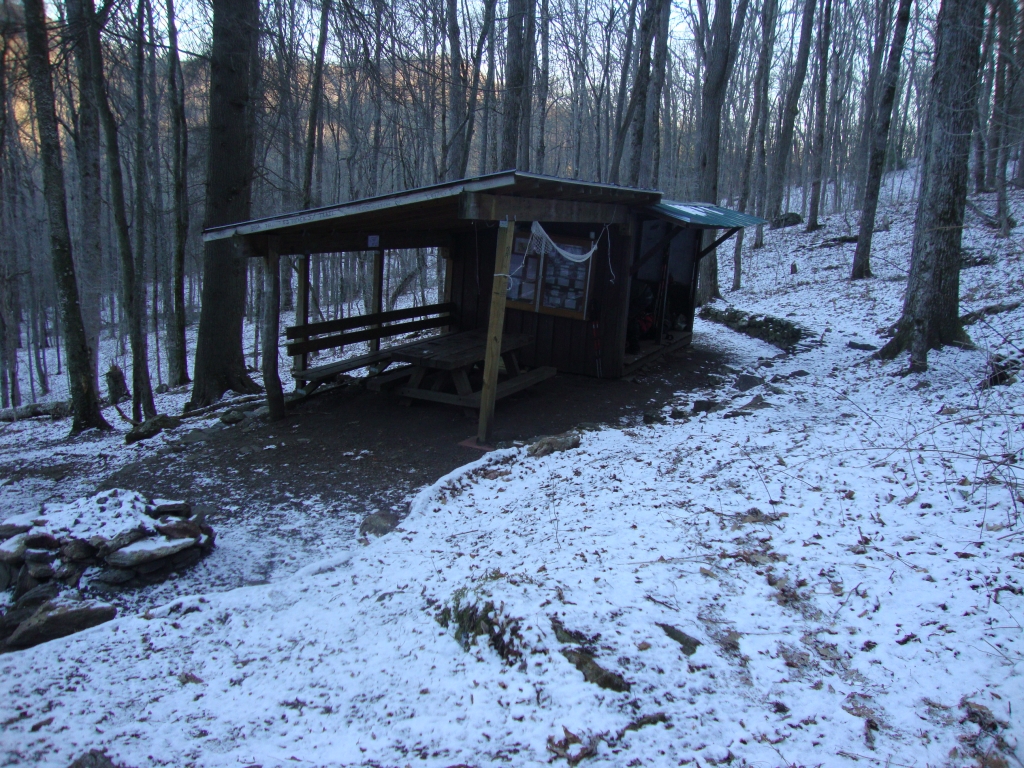 I arrived at this Rock Gap Shelter at 4:20 PM, and was glad to be inside! That night the temperature fell to 13 degrees F and water bottles froze solid, with the light snow seen in this 8:00 AM photo Thursday morning.