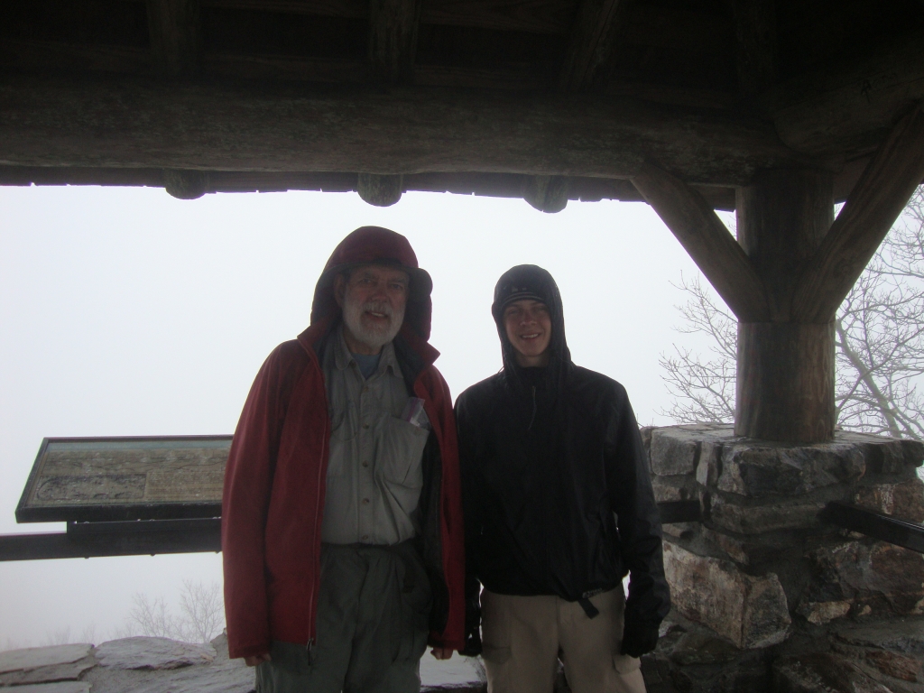 Atop the tower, Cinnamon and I have had our lunches and are almost ready to pull out. It's about 1:15 PM. Even with his heel blisters, with duct tape and cloth torn from his T-shirt applied, he walked much faster than I did, and was among those filling the Cold Spring Shelter when I arrived there at 4:30 PM.
