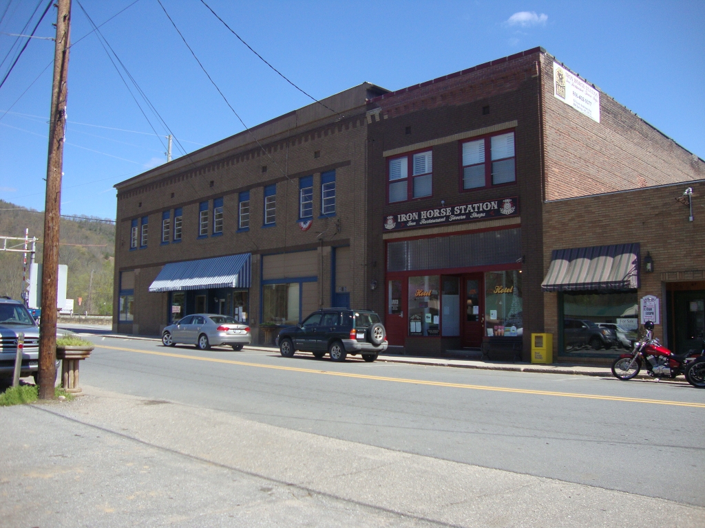 There's the hotel and restaurant, but also a gift shop and perhaps something else.