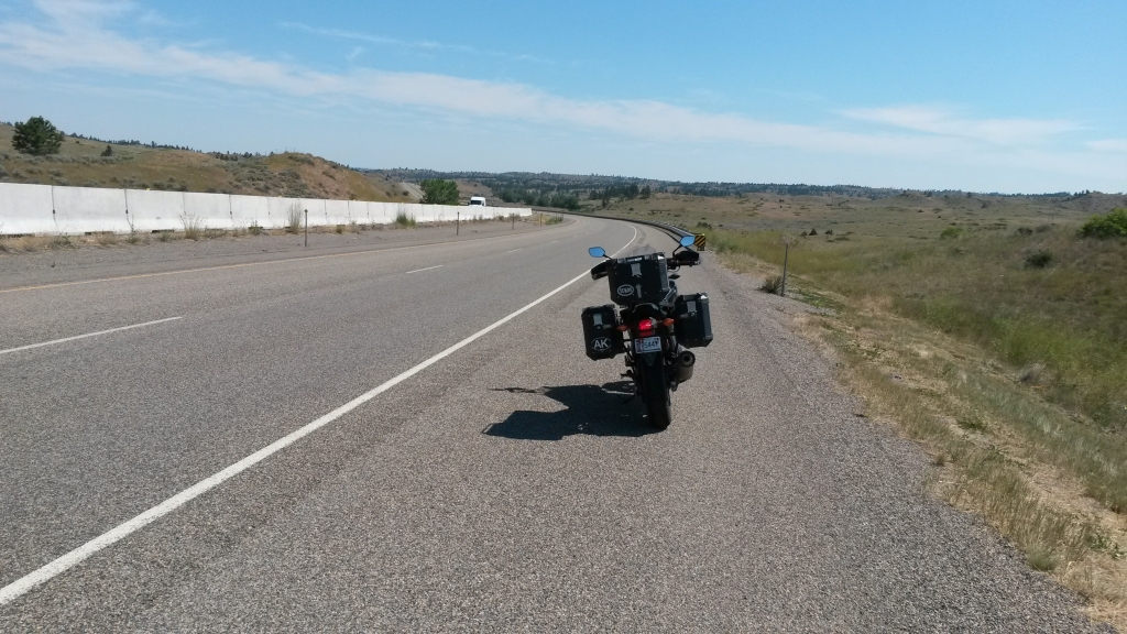 Day 9: Motel 6 in Bozeman was expensive and had no breakfast or in-room coffee. The GPS offered I-90/212 to Sturgis or I-94; I chose 94 and rewrote Frost: "Two roads diverged in the grass, and I, I took the one I traveled by, and that has made not much difference."