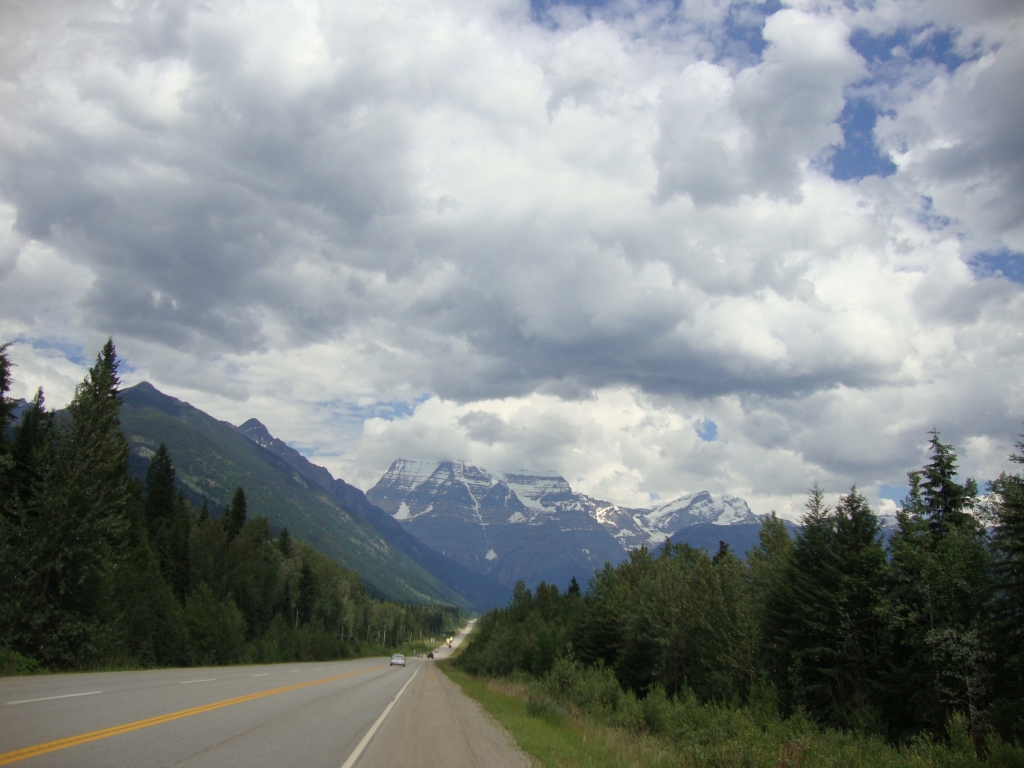 Mount Robson is the highest mountain in the Canadian Rockies, but the summit is hidden in clouds here. At about 1:45 PM, we're heading into Jasper National Park. 