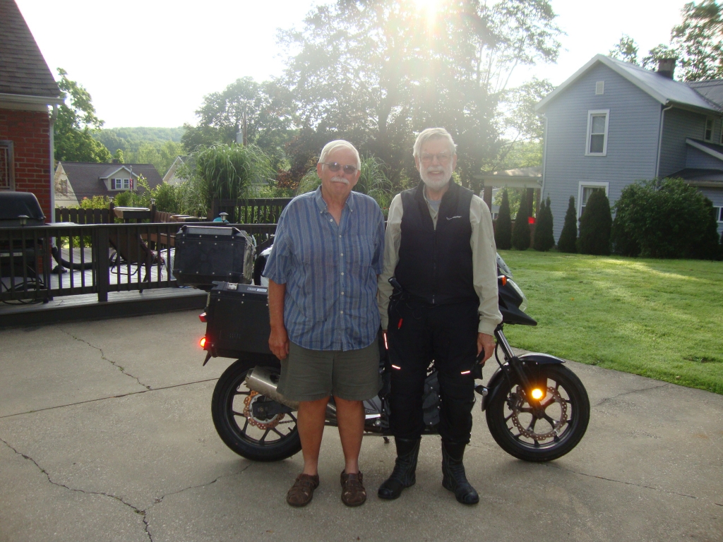Day 14: We arrived at Bob and Aggie's in Meadville PA at 1:15 PM July 9, Day #13 of the trip home. I'd ridden from Elkhart IN that day. In this shot, the following morning, I'm preparing to leave for home.