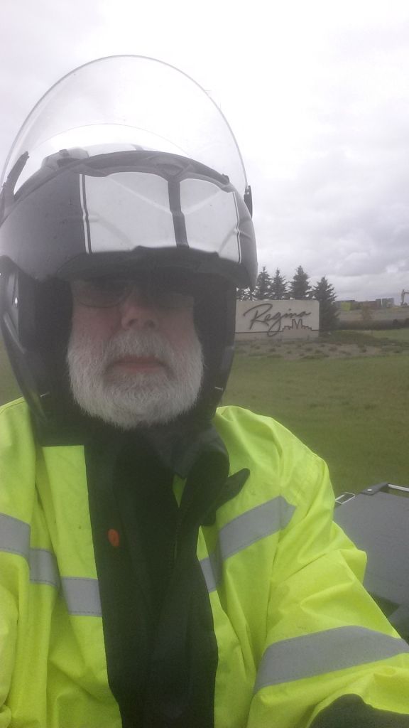 Unpleasant conditions in Regina: Noontime construction traffic and rain made getting these unpleasant. The afternoon and evening were very windy. Checking tire pressures at the Swift Current Motel 6 , I was nearly blown over.