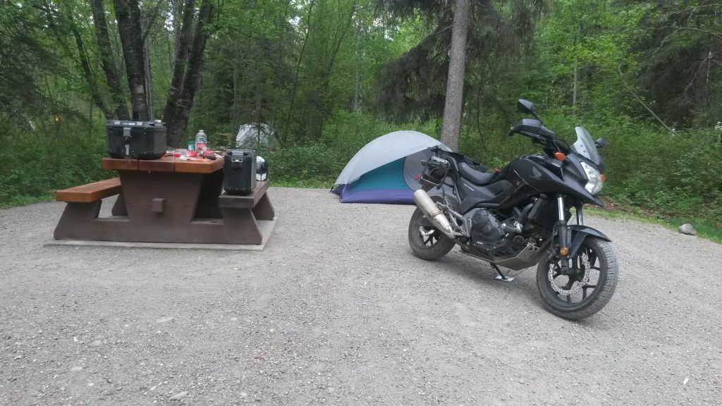 Night 12, Liard Hot Springs BC: I set up at Site 9 early enough for a dip in the hot spring, which Andrea never fails to encourage! A nice couple from Tennessee stopped by; they'd considered their Harleys for this trip but chose an RV.