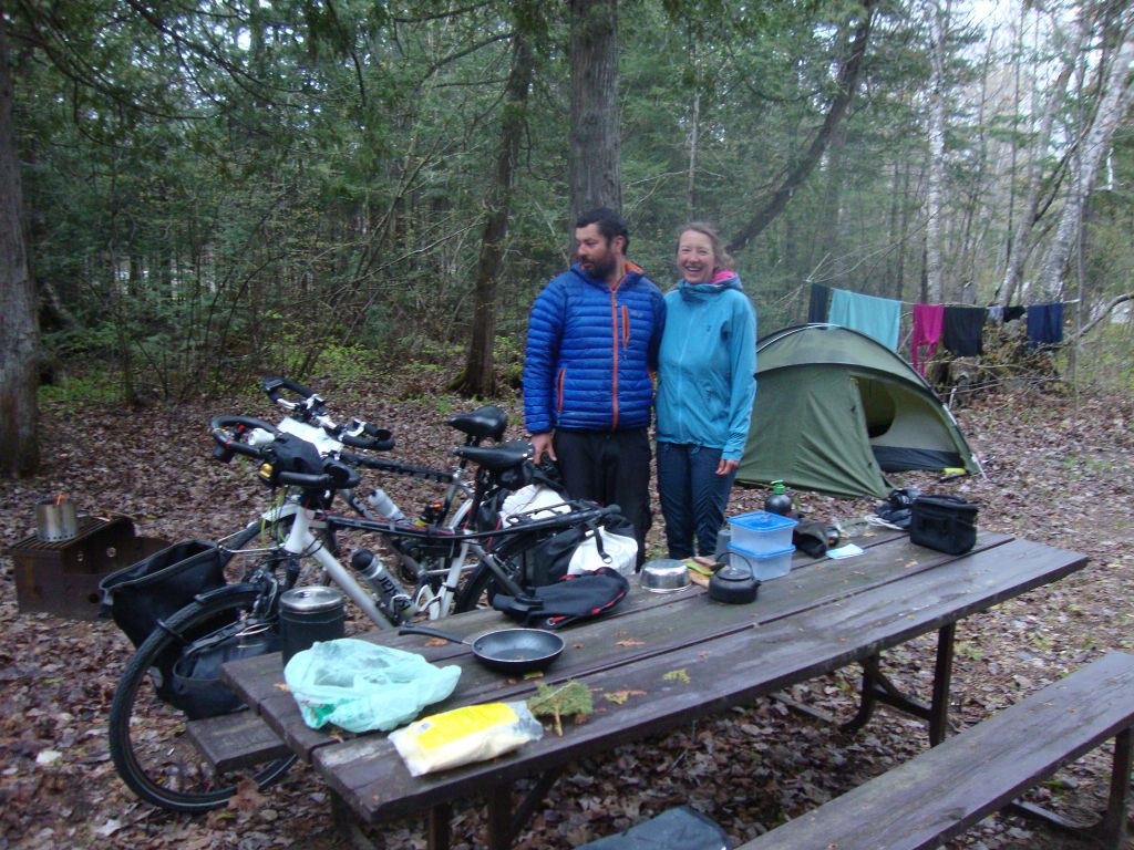 Bicycling to Whitehorse! Michael and Agnes, Polish bicyclists camped near me, had done 100 km today. Kind and chipper, Agnes said they hoped to see Whitehorse in the Yukon! I don't know what Michael is looking at.