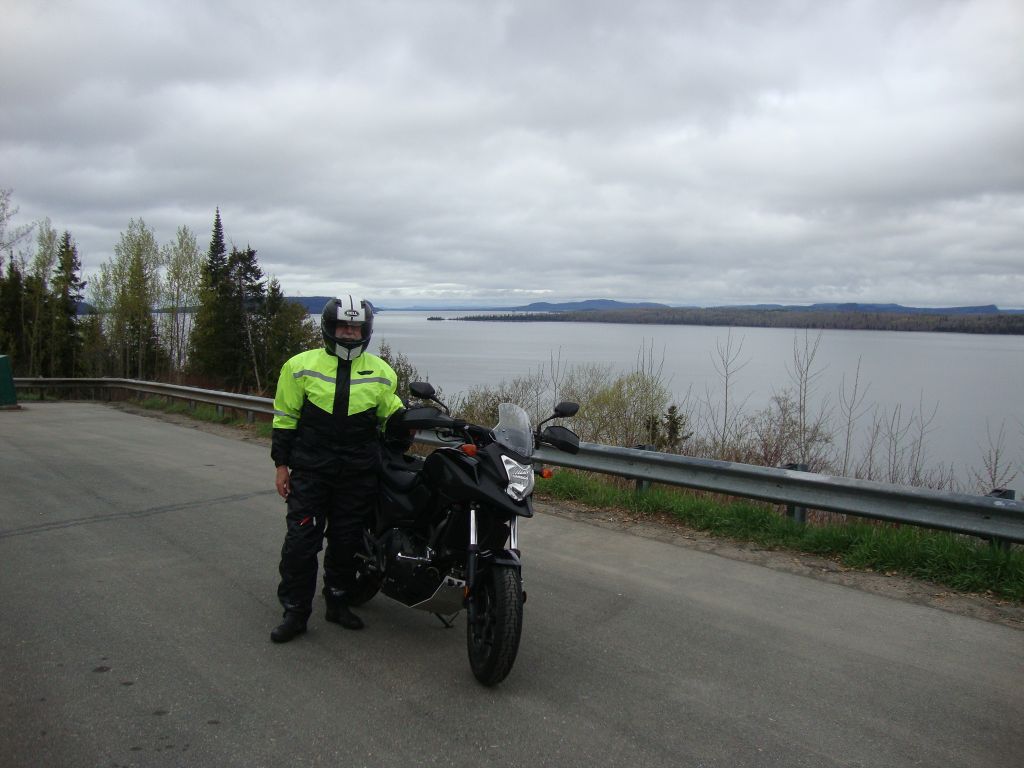Day 6, approaching Nipigon: Where's Day 5? I left Marathon but returned to the motel after 5 miles, unable to see more than 50 feet in the fog. Day #6 (Tuesday, May 23) began with rain but I was able to see! About 10 miles east of Nipigon, a pleasant tourist couple and I swapped photos.