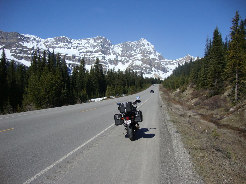 Day 10, Icefields Parkway! A typical view north at either 10:17 or 11:17 AM (time zone confusion). Leaving Yoho, I backtracked 25 km to Lake Louise for fuel and food. I took this beautiful road at about 60kph (40 mph), pulling over for more speedy vehicles. 