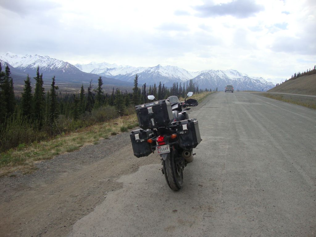 Day 16, almost home! Ready to leave Fast Eddy's, I discovered >3" slack in my drive chain. Tok's NAPA dealer had the necessary 27mm socket, so I tightened the chain and left about 10 AM. After lunch at Glenallen, here is a classic shot along the Glenn Highway. Anchorage and my daughter's, the end of this trip, is only a few hours away!