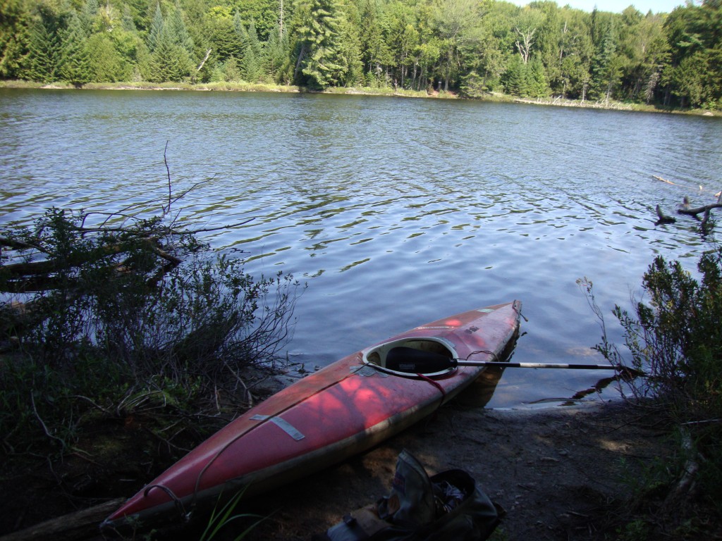 After an hour exploring the Pond, the kayak awaits its long carry. The put-in was directly across from this take-out.