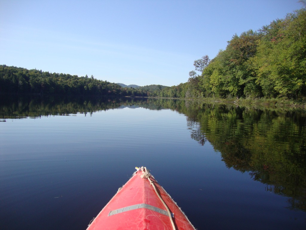 A month later, a 6.4 mile drive got us to the Deer Pond parking area at 9:20 AM. In another hour we were on Third Lake and half an hour later (with a 110-pace carry) First Lake. The photo looks toward its south end.