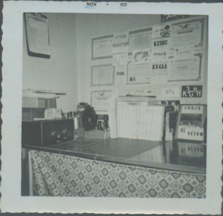 The other end of my operating position. There are some spare 8005 tubes above the typewriter, the Philco 116-X radio and my first 6AG7 transmitter in the corner, my collection of QST magazines, and award and appointment certificates and interesting QSL cards. By this time my work in Western Pennsylvania traffic nets had earned me an Official Relay Station certificate.