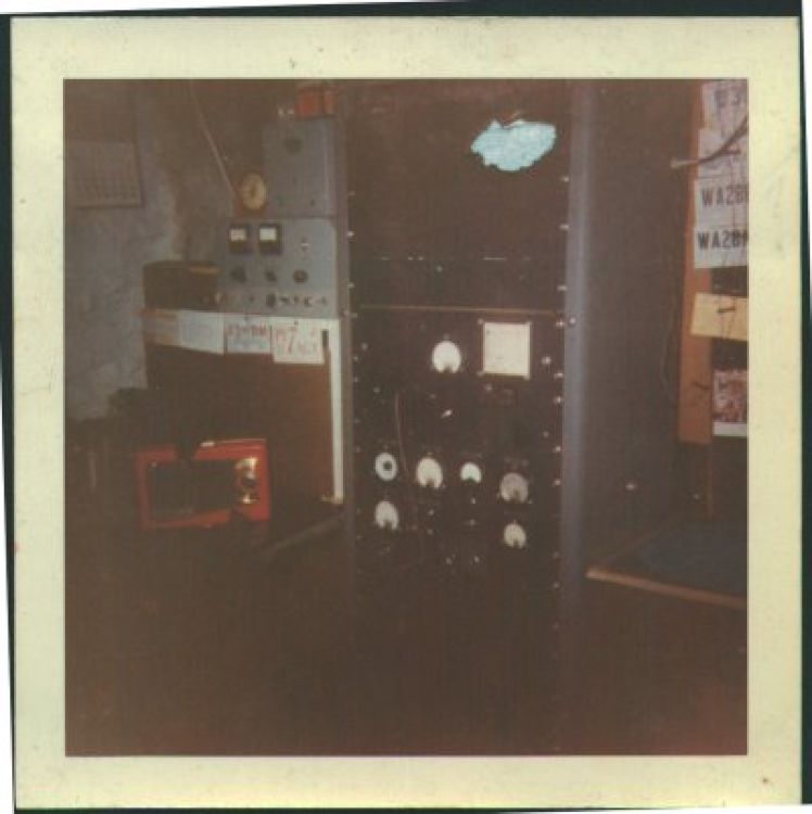My first homebrew transmitter, the 6AG7 10-watt rig, and my Heathkit VF-1 VFO, are behind the panel that contains the frequency chart. This shot is to the right of the operating position in the previous photo.
