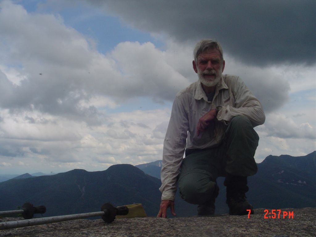 Two and a half hours after leaving my lodging for the night, Orebed Brook Leanto, I'm on the Big Slide summit. What's that big dark thing overhead?
