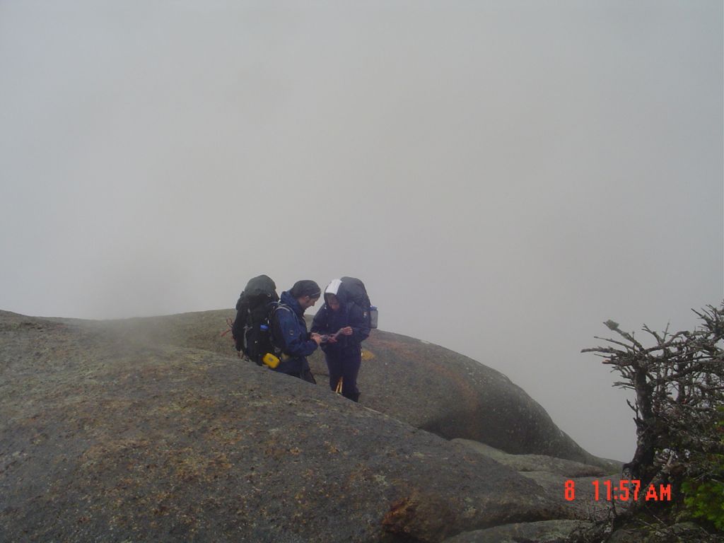 Almost ready to leave for Basin, I saw this group consulting a map (I think). They may be my French-Canadians leanto-mates last night.