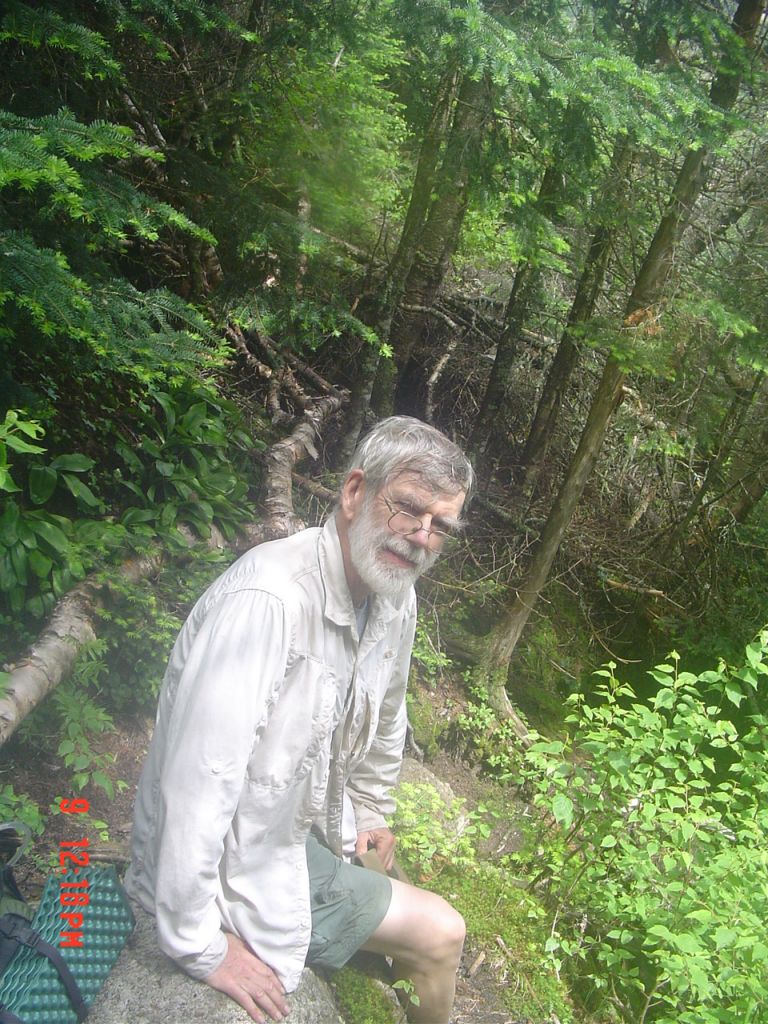 Shortly after noon two men ascending the trail snapped my photo. Black flies were bad!