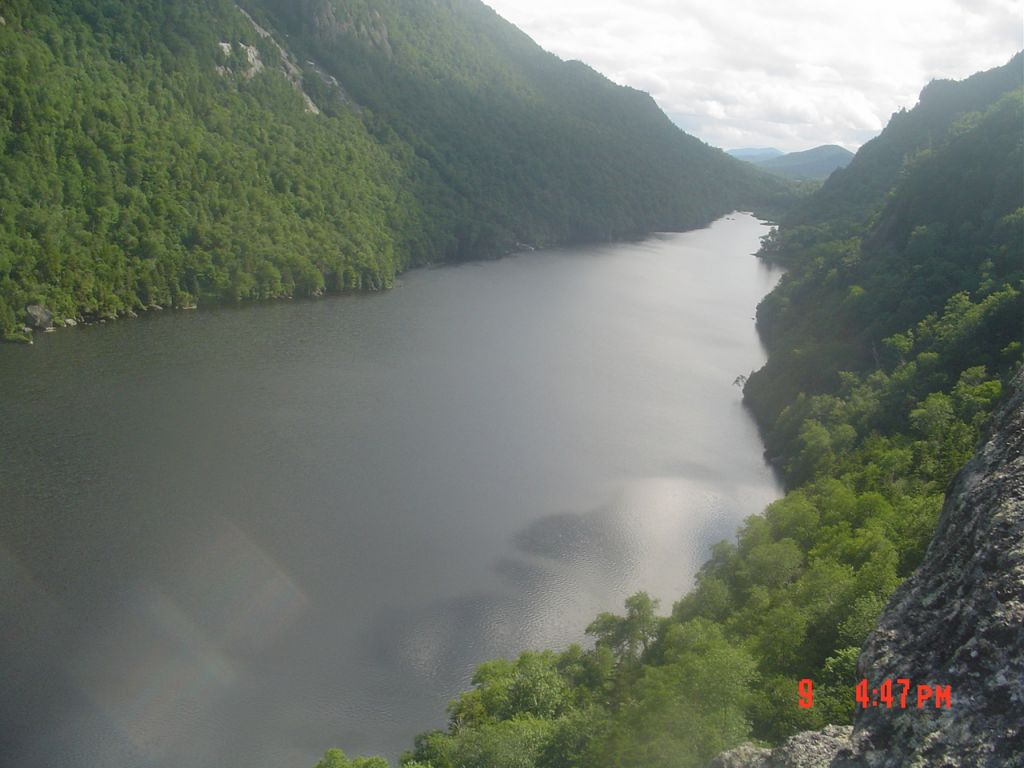 At 3:21 I crossed onto Adirondack Mountain Reserve land, and descended steeply to the lake a bit over an hour later. I now had to backtrack north, along the west shore to reach the dam, which arrived about 5:30 PM. 