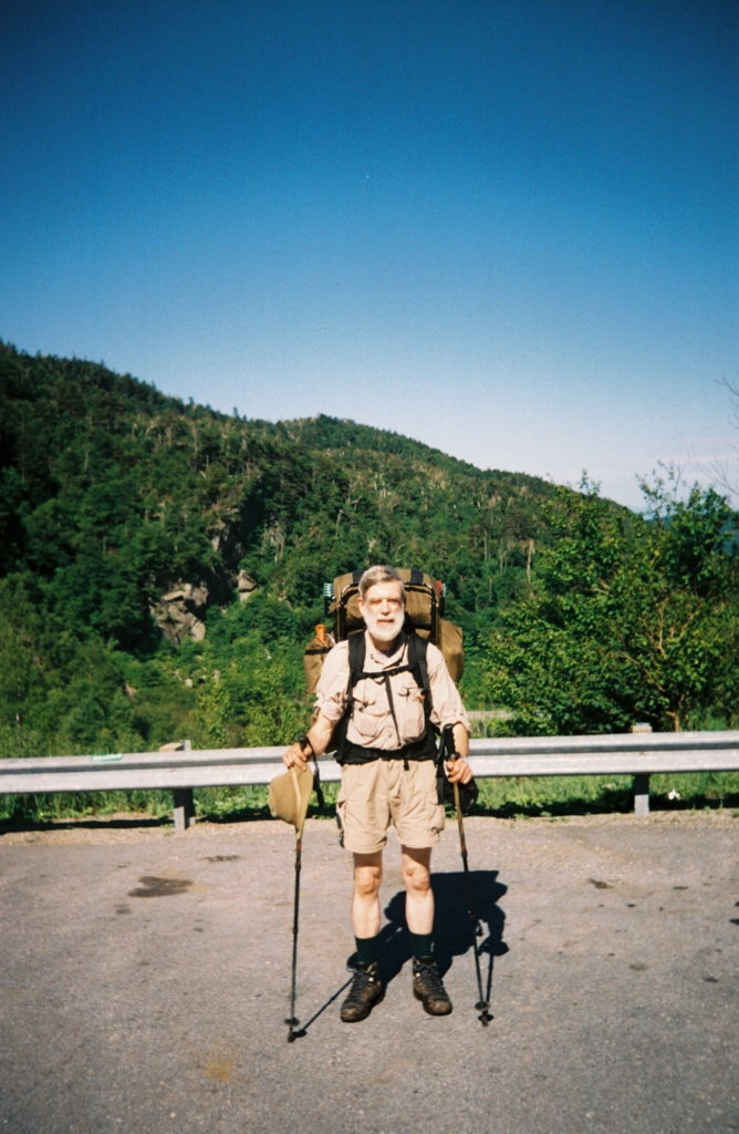 On Wednesday July 7 I partly abandoned my Adirondack bushwhacking dress and tried shorts. At 9:30 a motorcyclist snapped this photo at the Appalachian Gap parking area, as I headed into Camel's Hump State Forest.