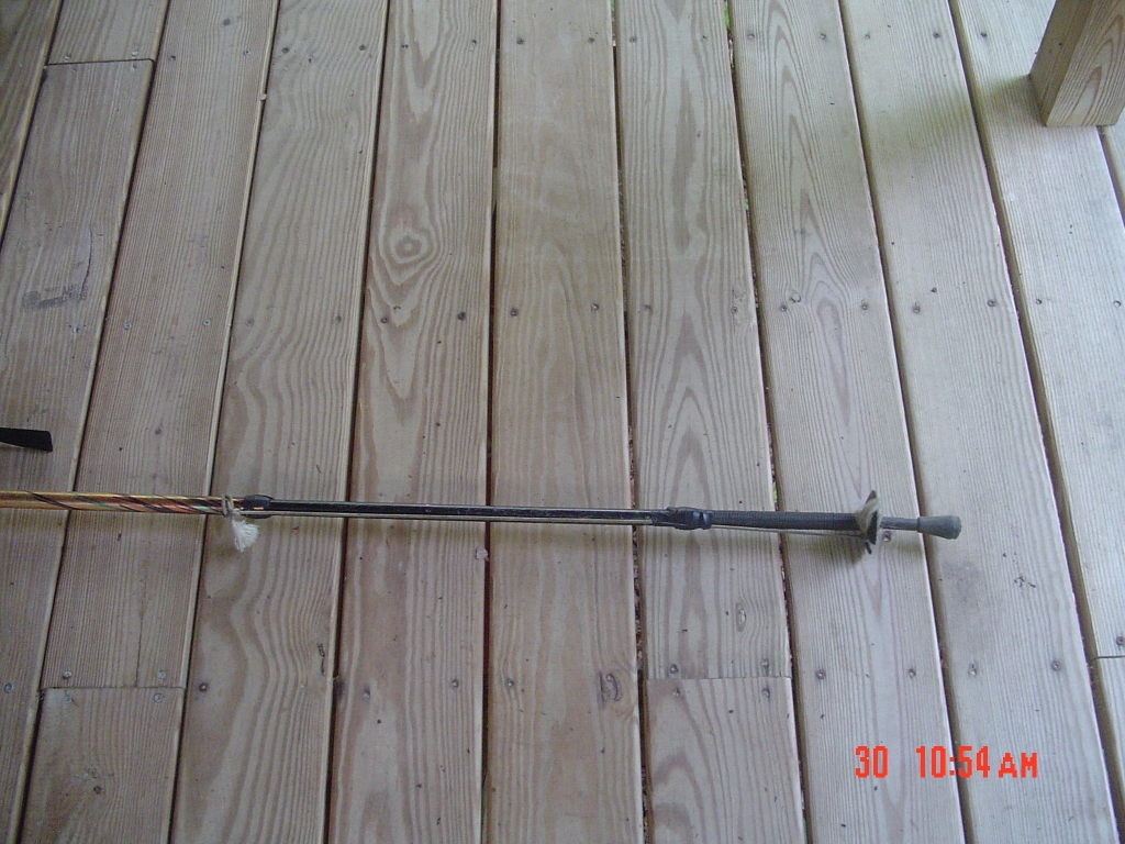 This shows how I spent part of that Taft afternoon! The cord held the foot on,  but a spacer was required to set the proper length. The photo was taken after I got "home," on our camp's porch June 30.