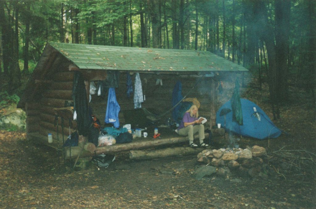 At Spruce Lake Leanto #1, one of my fellow hikers is studying her trail guide.