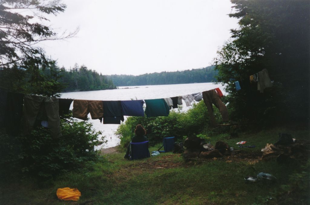 At Spruce Lake, the other woman in the group is enjoying the view as our clothes dry.