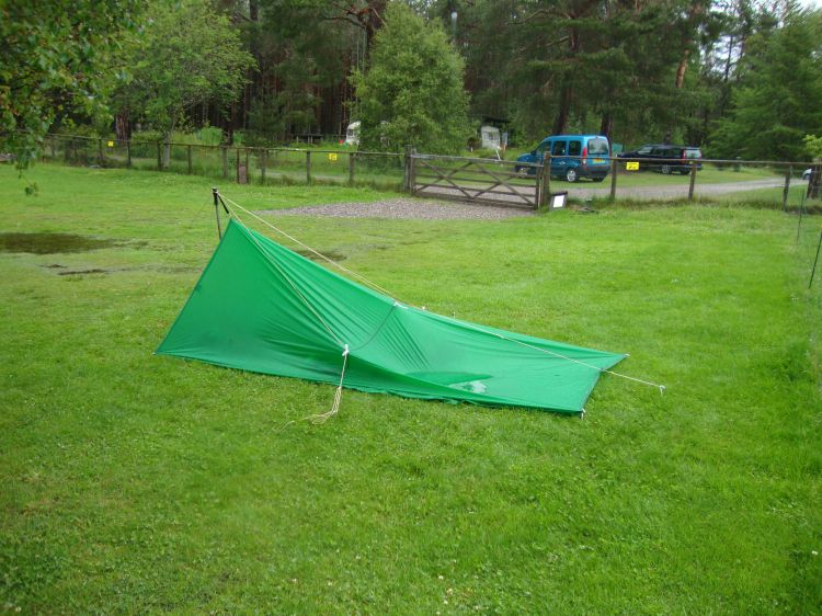 Lazy Duck campgrounds, a mile north of Nethybridge, 8:00 AM Wednesday, June 22. I stayed dry and warm, and rested well, during a rainy first night on the Speyside Way. The campers' shelter is behind the tree and in front of the blue vehicle.