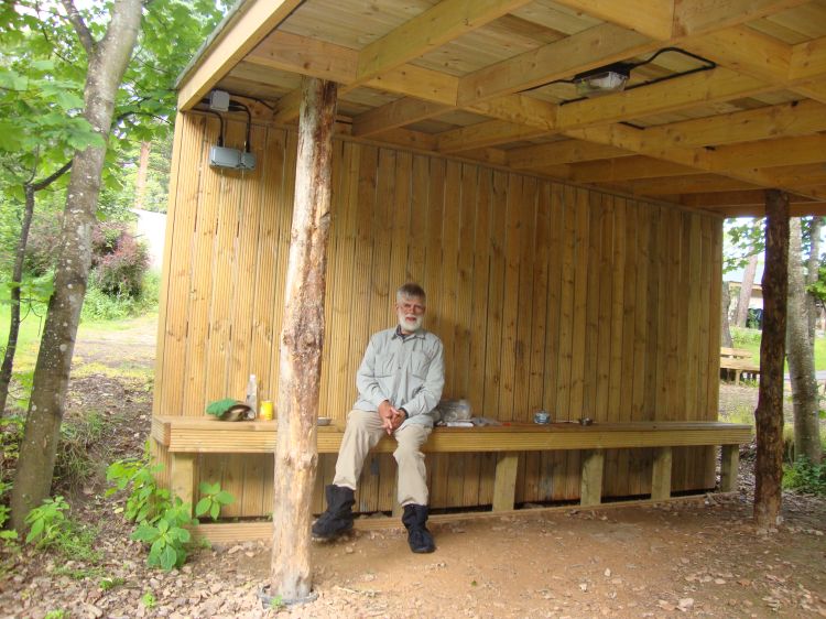 At 3:45 PM I depacked at Burnside Caravanners’ Park on the east side of  Fochabers. I could have arrived an hour earlier, but absentmindedly followed the Way around the town, discovering my error at its west side. Although clearly designed for RVs, the Park had this nice shelter near the tenting area, and great showers.  
